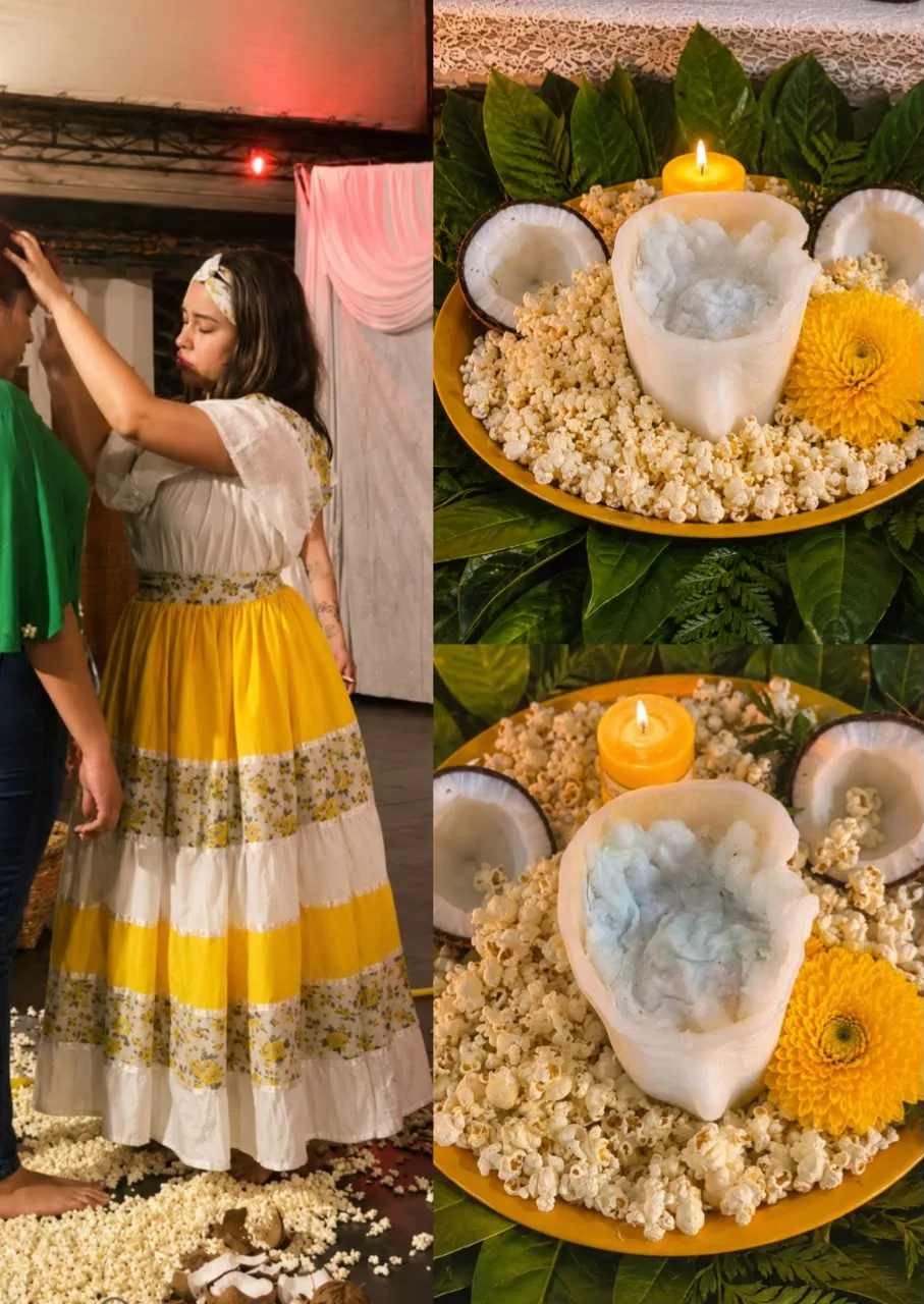 Paola da Farrapo atendendo de saia amarela e oferenda de pipoca, coco e flor sobre folhas verdes